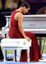 Alicia Keys bows after singing the National Anthem prior to the start of Super Bowl XLVII between the Baltimore Ravens and the San Francisco 49ers at the Mercedes-Benz Superdome on February 3, 2013 in New Orleans, Louisiana. (Photo by Jamie Squire/Getty Images)