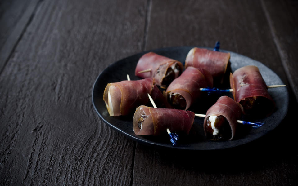<p>Jennifer Farley</p><p>A real crowd-pleaser that takes almost no time to put together.</p><p><strong>Get the recipe: <a href="https://parade.com/287051/jenniferfarley/think-prosciutto-wrapped-dates-with-goat-cheese-sound-hard-think-again/" rel="nofollow noopener" target="_blank" data-ylk="slk:Prosciutto-Wrapped Dates With Goat Cheese Or Boursin;elm:context_link;itc:0;sec:content-canvas" class="link ">Prosciutto-Wrapped Dates With Goat Cheese Or Boursin</a></strong></p>