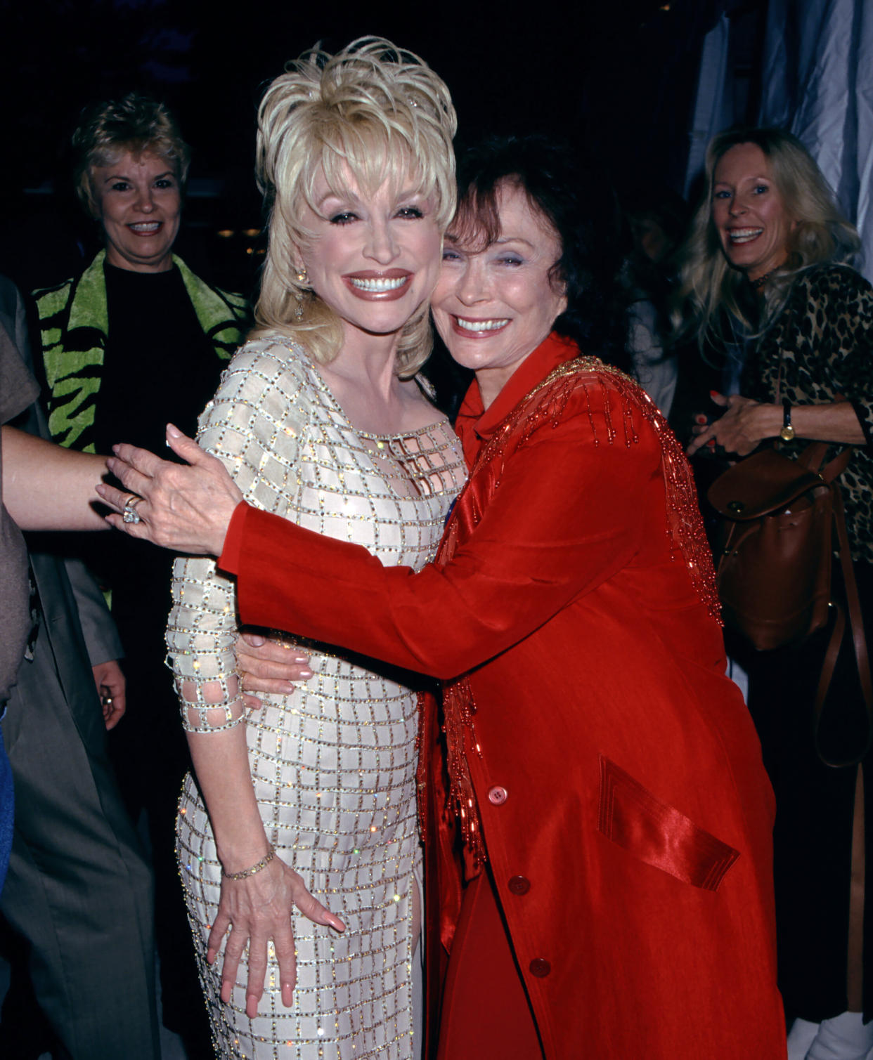 Dolly Parton with Loretta Lynn at the Grand Ole Opry in Nashville, TN in 1997. (Ron Davis / Getty Images)