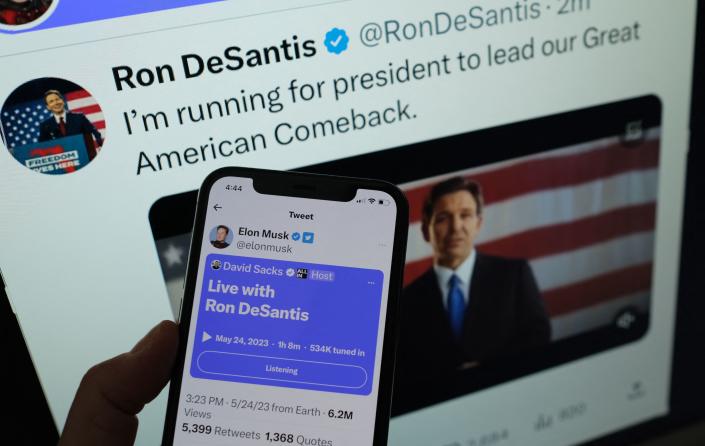 An illustration photo shows the live Twitter talk with Elon Musk against a background showing Ron DeSantis as he announces his 2024 presidential run on Twitter.