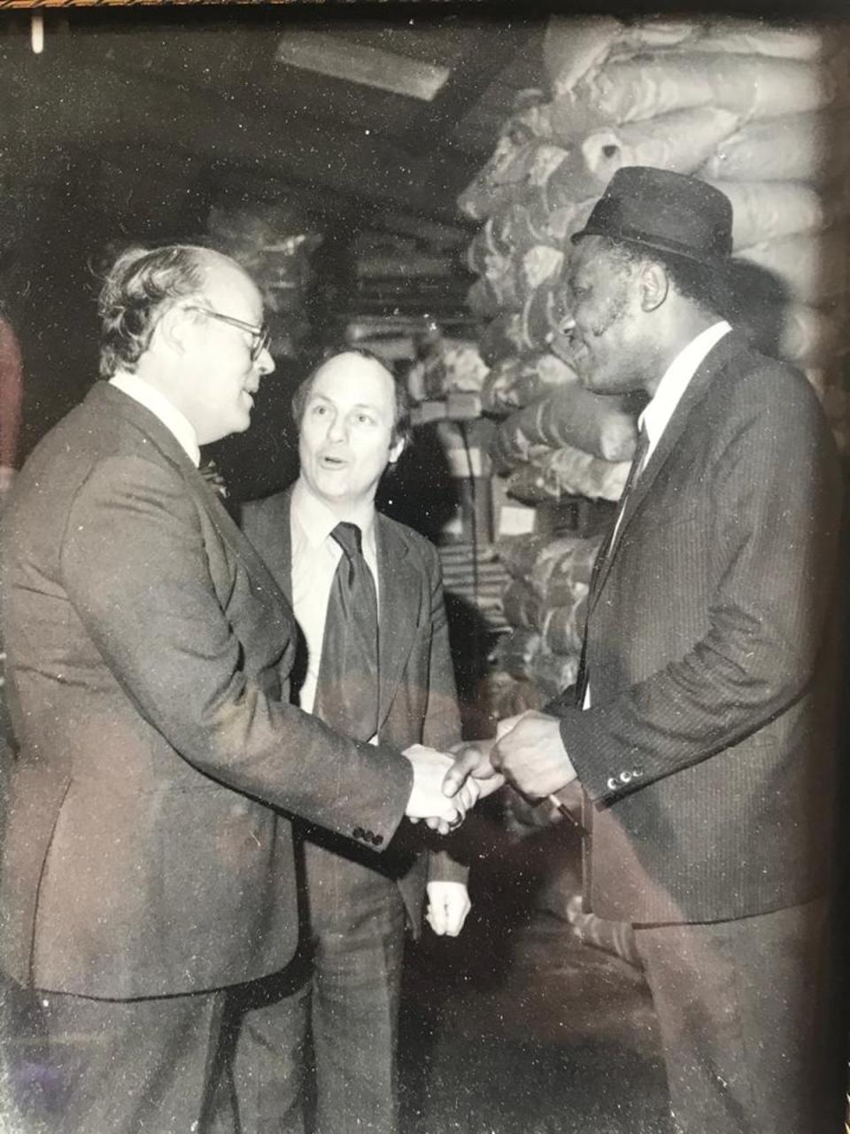 Rex (right) after he arrived as part of the Windrush generation and worked as a manager at a plastics company (Provided)