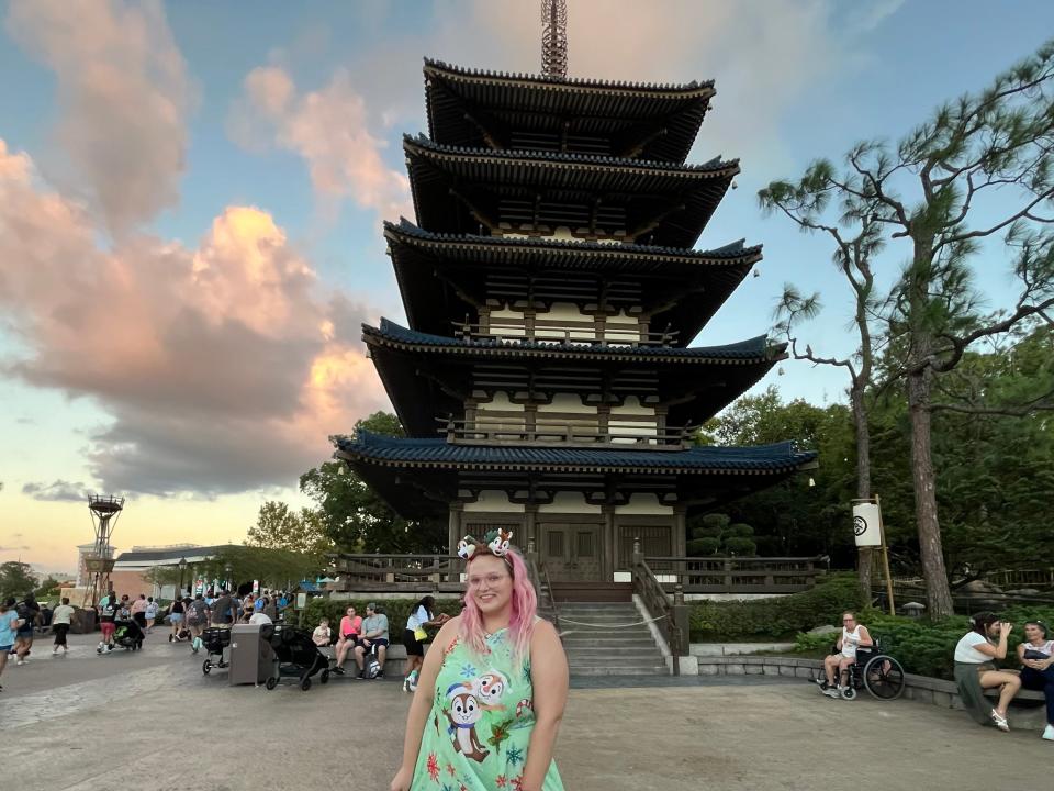 Casey Clark standing in front of the Japan Pavilion