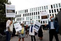 Supporters of activists gather at the District Court of West Lausanne