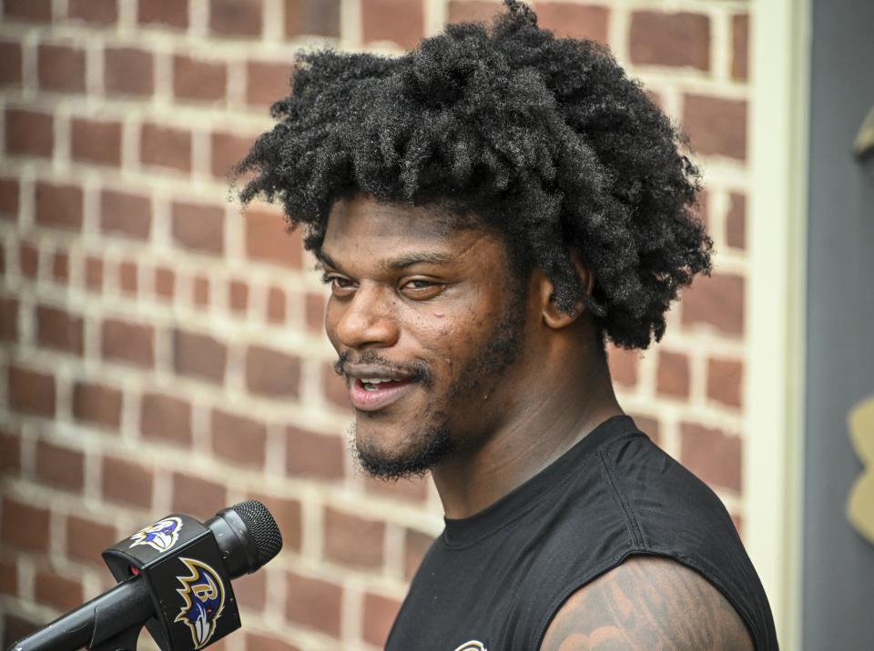 Baltimore Ravens' quarterback Lamar Jackson answers questions after practice on Wednesday, Sept. 7, 2022, in Owings Mills, Md. (Kevin Richardson/The Baltimore Sun via AP)