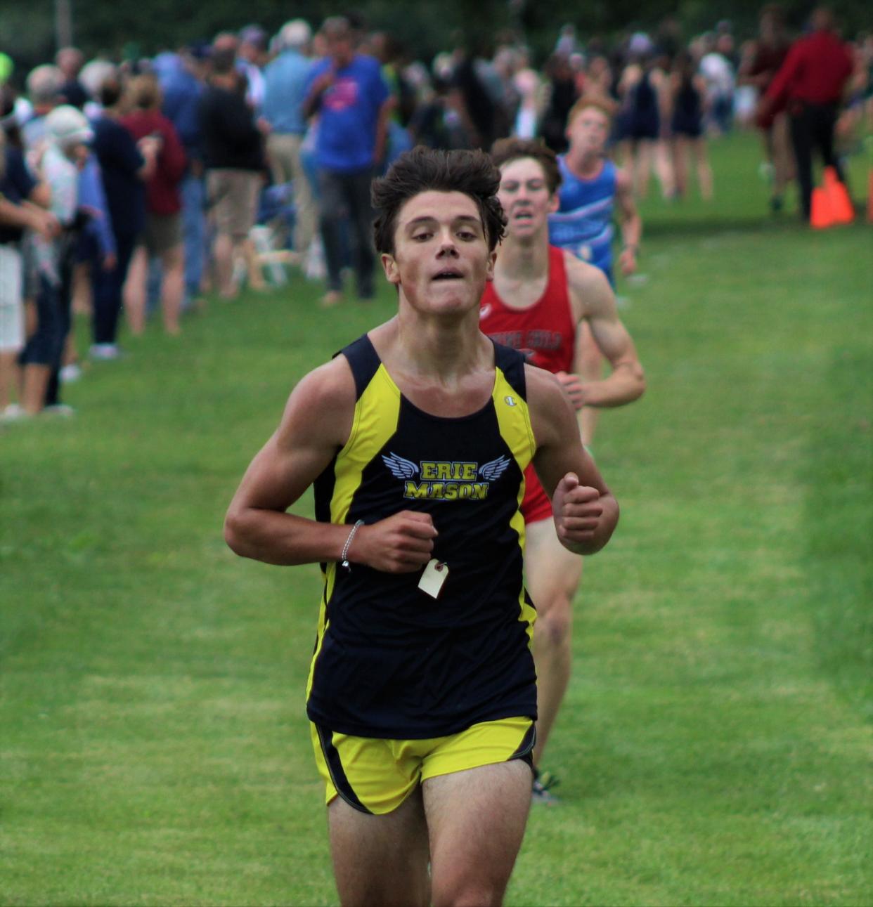 Erie Mason's Jackson Ansel runs at the 40th annual Mason Relays earlier this season.