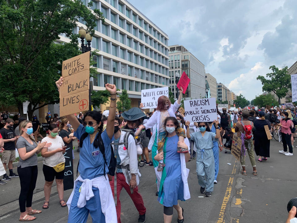 Image: Medical workers protest (Lauren Egan / NBC News)