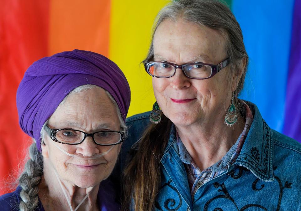 LGBTQ activist and advocate Meta Ellis, left, with her wife Emma McDaniel Ellis are seen in Montgomery, Ala. on Wednesday November 16, 2022. 