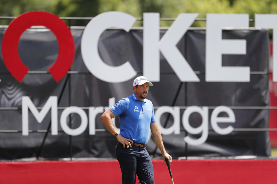 Scott Stallings waits to putt on the 18th green during the first round of the Rocket Mortgage Classic golf tournament, Thursday, July 2, 2020, at the Detroit Golf Club in Detroit. (AP Photo/Carlos Osorio)