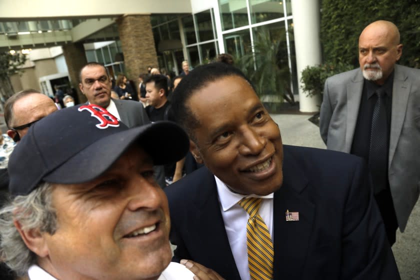 WOODLAND HILLS, CA - AUGUST 24, 2021 - Conservative radio talk show host Larry Elder, who is running for governor of California, greets supporters at the Warner Center Marriott in Woodland Hills on August 10, 2021. (Genaro Molina / Los Angeles Times)