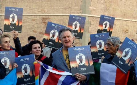 Survivors of clerical sex abuse, including Briton Peter Saunders, outside Castel Sant' Angelo near the Vatican  - Credit: Gregorio Borgia/AP