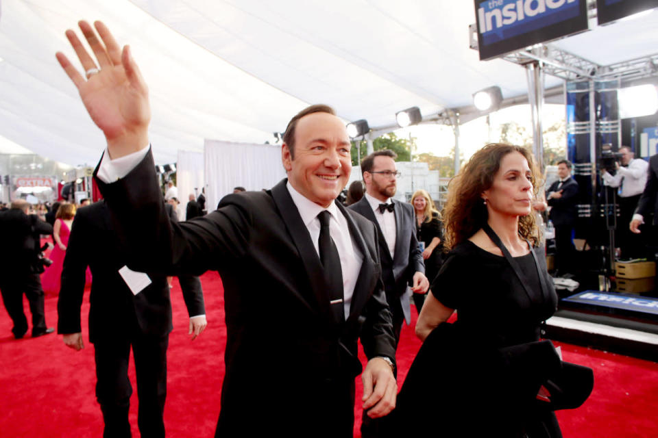 Kevin Spacey waving on the red carpet at the 22nd Annual Screen Actors Guild Awards at The Shrine Auditorium on January 30, 2016 in Los Angeles, California.