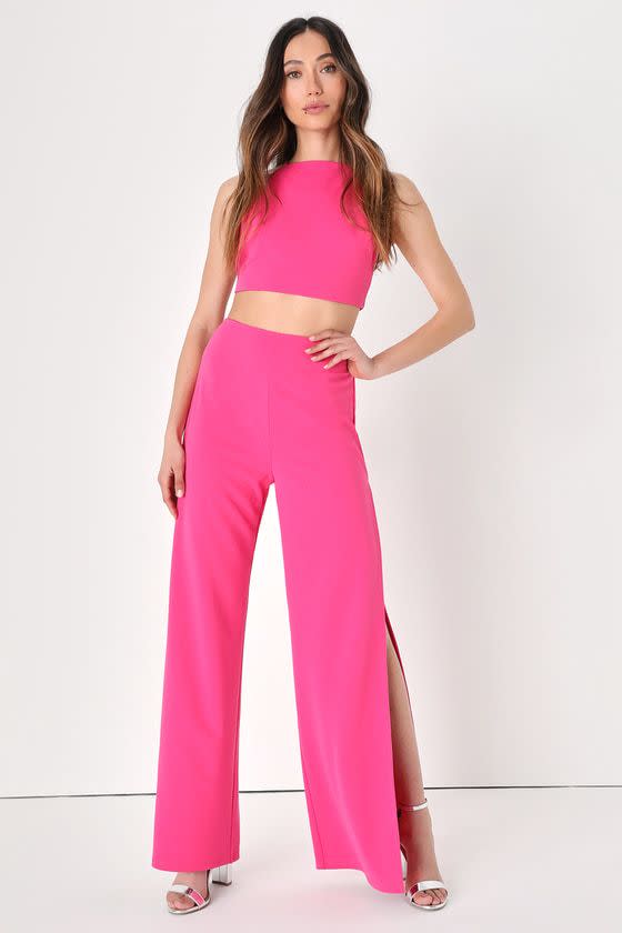 <p><a href="https://go.redirectingat.com?id=74968X1596630&url=https%3A%2F%2Fwww.lulus.com%2Fproducts%2Fpoised-perfection-hot-pink-tie-back-wide-leg-two-piece-jumpsuit%2F2043976.html&sref=https%3A%2F%2F" rel="nofollow noopener" target="_blank" data-ylk="slk:Shop Now;elm:context_link;itc:0;sec:content-canvas" class="link ">Shop Now</a></p><p>Poised Perfection Hot Pink Tie-Back Wide-Leg Two-Piece Jumpsuit</p><p>$27.30</p><p>lulus.com</p>