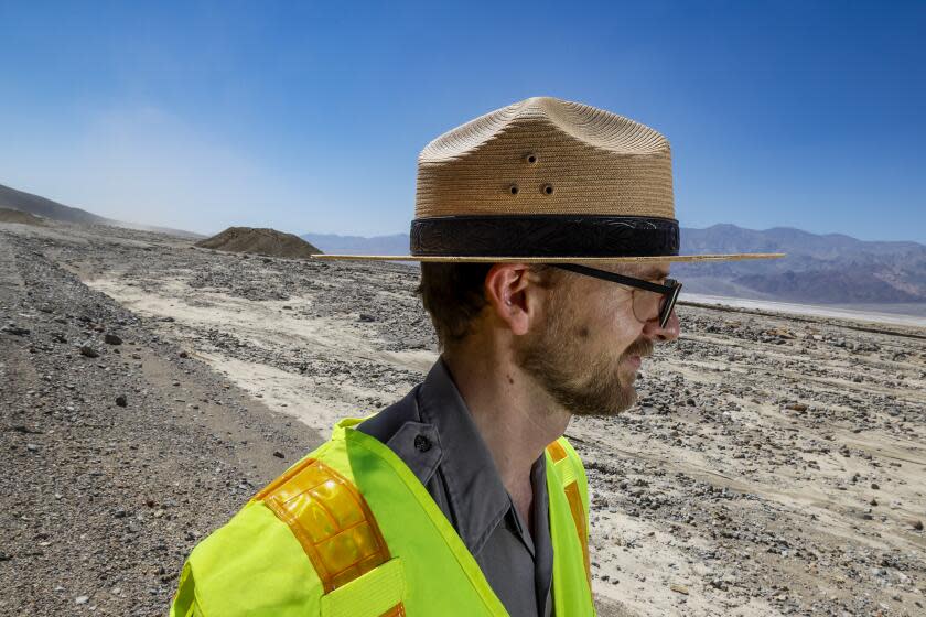 Death Valley, CA, Thursday, August 31, 2023 - Park Ranger Matthew Lamar leads a media tour along Badwater Rd. where crews are working to clear mud and debris left over from last week's Tropical Storm. (Robert Gauthier/Los Angeles Times)