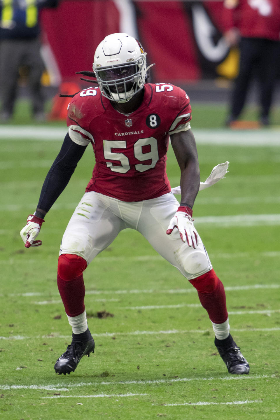 FILE - Arizona Cardinals outside linebacker De'Vondre Campbell (59) is shown in action against the Miami Dolphins during an NFL football game in Glendale, Ariz., in this Sunday, Nov. 8, 2020, file photo. The Green Bay Packers have added a veteran presence at inside linebacker by signing De’Vondre Campbell. Campbell comes to Green Bay after starting all 16 games for the Arizona Cardinals last season and posting 99 tackles, including 69 solos. (AP Photo/Jennifer Stewart)