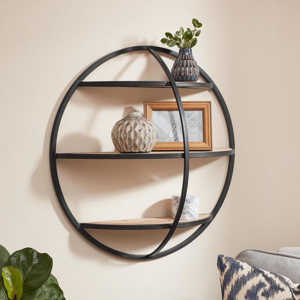 This stunning shelf is a great way to display succulents, photos and more. (Photo: Home Depot)