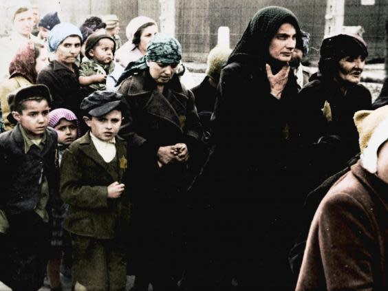 Women and children wearing the Star of David (The Auschwitz Album — Serge Klarsfeld/Lily Jacob-Zelmanovic Meier)