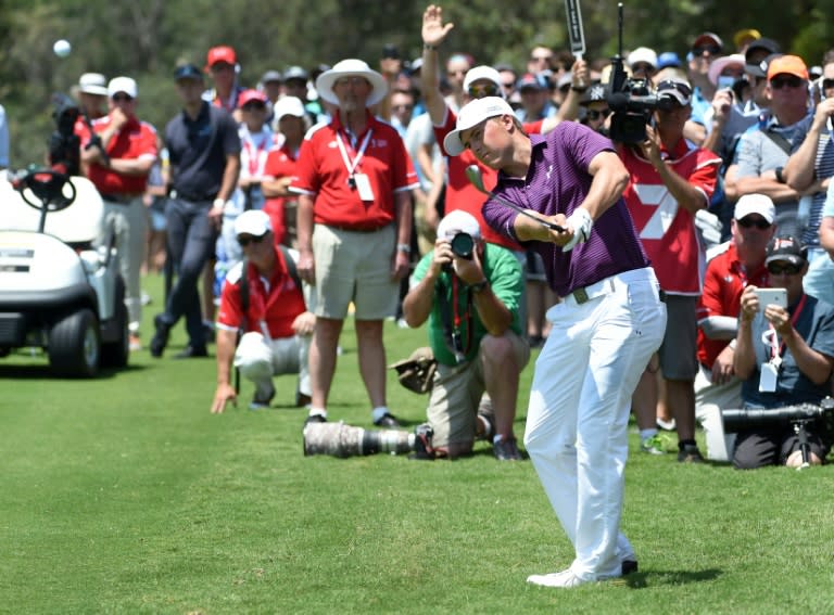 American Jordan Spieth hits to the green on the way to finishing in a tie for second place in the Australian Open golf tournament in Sydney on November 29, 2015