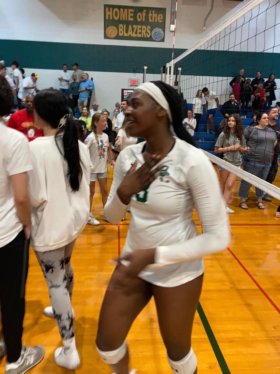 Boca Raton Christian volleyball player Tekoa Barnes celebrates the Blazers' win over Orangewood Christian in the Class 2A state semifinals on Friday.