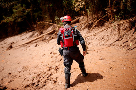 A firefighter is seen after a tailings dam from Brazilian miner Vale SA burst in Brumadinho, Brazil January 27, 2019. REUTERS/Adriano Machado