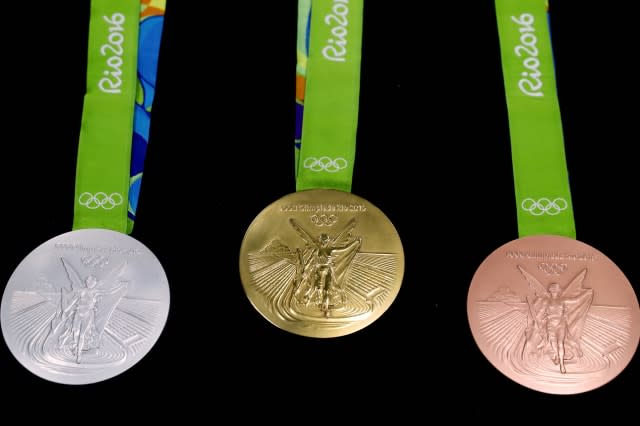 How much is an Olympic gold medal worth