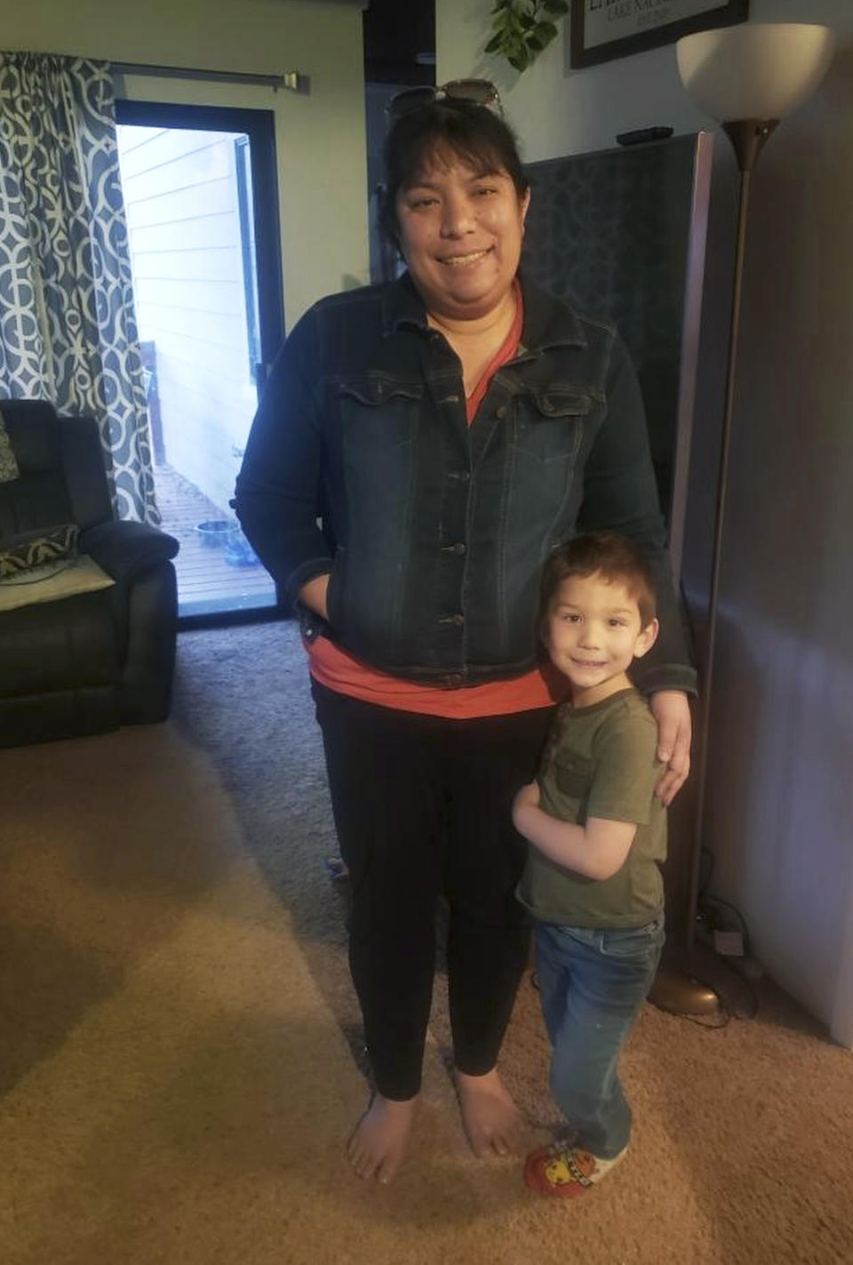 In this undated photo provided by the Doan family, Kyle Doan poses with his mother, Lindsy Doan. The 5-year-old was swept away by floodwaters near San Miguel, Calif., on Monday, Jan. 9, 2023. Search efforts for the missing boy continued for a third day, Wednesday, Jan. 11. (Courtesy of the Doan Family via AP)