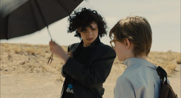 <em>Boris (Finn Wolfhard) and Theo in his Brooks Brothers shirt from the Barbours. Photo: </em><em>Macall Polay/Courtesy of Warner Bros. Pictures</em>