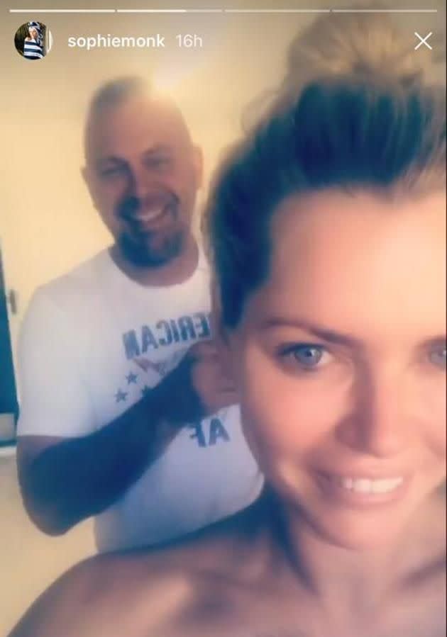 John and Sophie was seen laughing while he got her ready for the spray tan. Source: Instagram