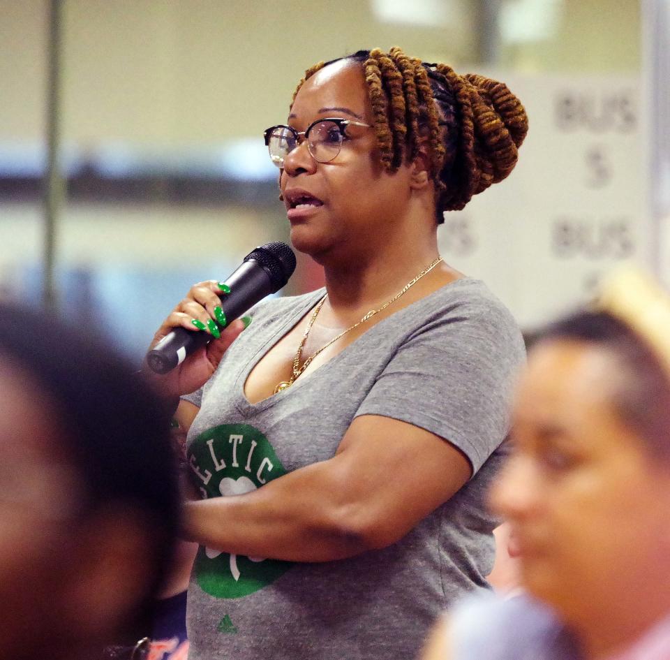 Dr. Lise McKenzie of Brockton speaks at the Brockton School Committee Open Forum meeting at the highschool on Tuesday, July 11, 2023. Dr. McKenzie is a licensed mental health counselor who operates a private practice in Brockton called Healthy Girls & Women's Institute and spoke about the immigrant's perspective of the issues discussed at the meeting, and she also wanted to see the data the School Committee referred to when considering a reduction of cell phone use on the part of the students.