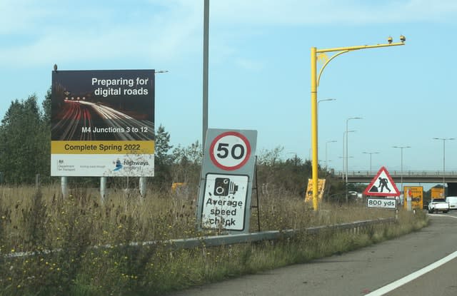 A sign announcing the forthcoming ‘smart motorway’ on the M4 (Yui Mok/PA)