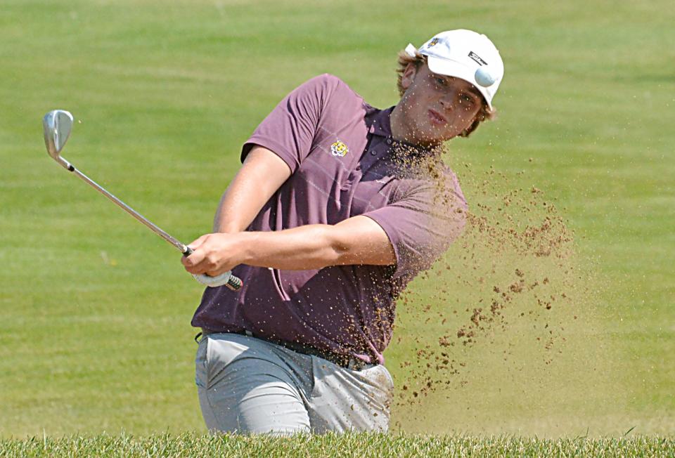 Hayden Scott of Sioux Falls hits a bunker on No.  6 Red during 16-18 boys division play in the South Dakota Golf Association's Junior Championship at Cattail Crossing Golf Course on Monday, July 24, 2023.