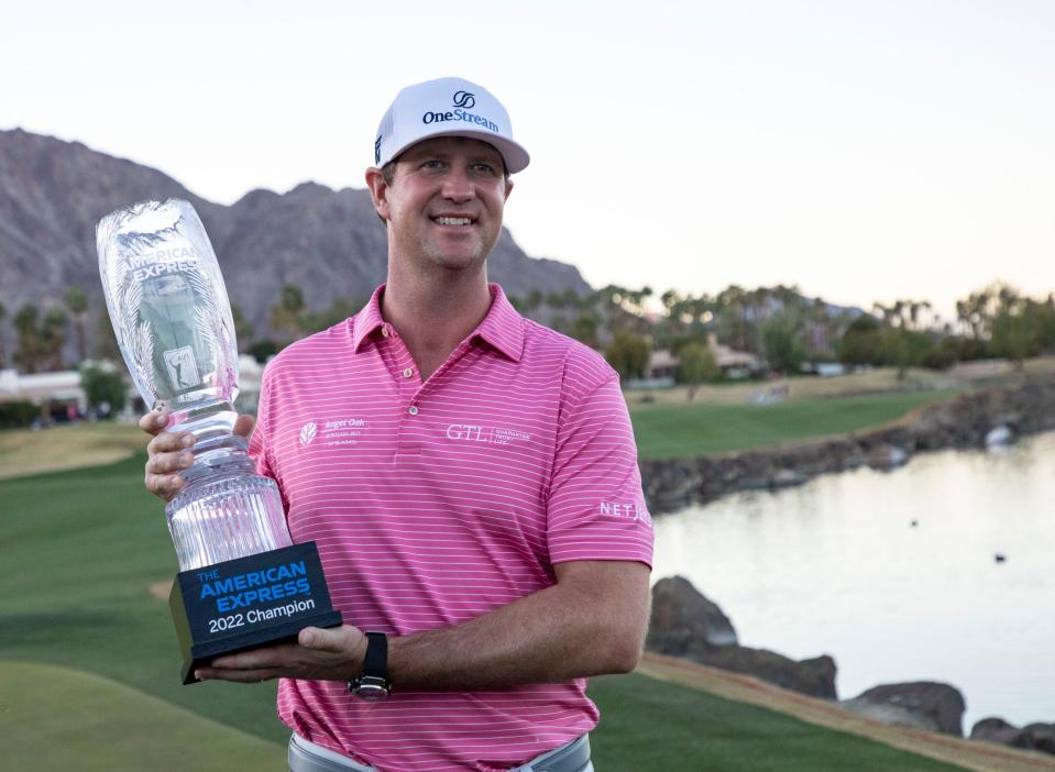 Jan. 23: Hudson Swafford holds the trophy after winning The American Express at PGA West in La Quinta, California.