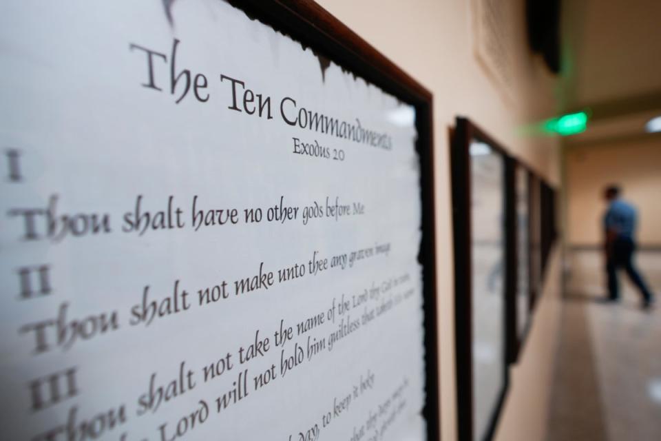 FILEA copy of the Ten Commandments is posted along with other historical documents in a hallway of the Georgia Capitol on June 20. Civil liberties groups filed a lawsuit on June 24 challenging Louisiana’s mandate that public school classrooms display the Ten Commandments. (AP)