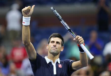 Sep 8, 2015; New York, NY, USA; Novak Djokovic of Serbia celebrates after defeating Feliciano Lopez of Spain on day nine of the 2015 U.S. Open tennis tournament at USTA Billie Jean King National Tennis Center. Mandatory Credit: Jerry Lai-USA TODAY Sports