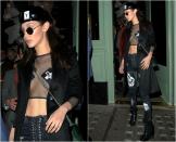 <p>Bella Hadid wurde gesichtet, als sie beim Besuch eines Nachtclubs mit Kendall Jenner während der Londoner Fashion Week in einem sexy, durchsichtigen Crop-Top aus Netzstoff und kreuzförmigen Pasties viel Haut zeigte. Das Supermodel kombinierte das Top anständig mit einem schwarzen Trenchcoat und hüfthohen Jeans mit Schnürung und Totenkopfdruck – und verströmte damit einen lockeren, schicken Vibe. (Bilder: Getty) </p>