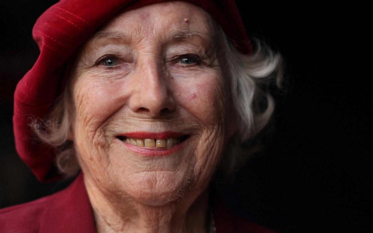  Forces sweetheart Dame Vera Lynn poses for photographs in central London, on October 22, 2009. - Renowned British singer Vera Lynn, the so-called "forces sweetheart" who helped keep up morale during World War II, has died aged 103 - SHAUN CURRY/AFP