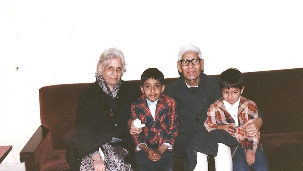 A family photo provided by Rep. Ro Khanna, D-Calif. Khanna poses with his grandfather, grandmother and brother. Khanna's grandfather was an Indian Freedom Fighter for over 15 years.