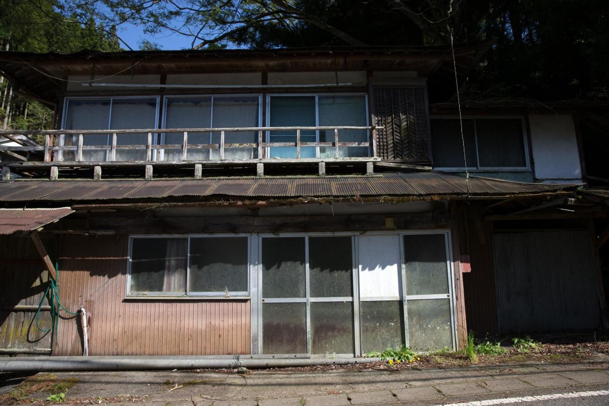 <span>Abandoned <em>akiya</em> house in a small village in Miyoshi, Japan. Figures released this week shows the number of vacant houses in Japan has topped 9m.</span><span>Photograph: Carl Court/Getty Images</span>