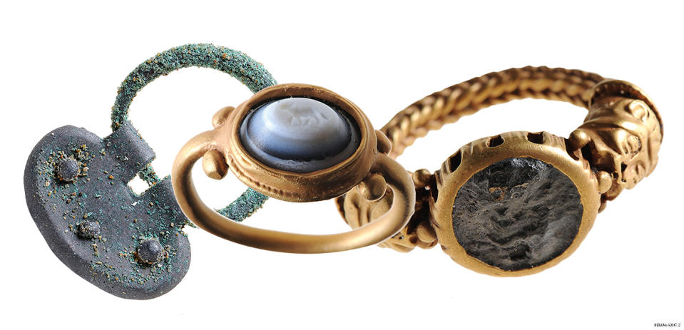 Two Roman rings and a section of a belt buckle were found by a member of the public at Murlough in 2014 (NMNI/PA)