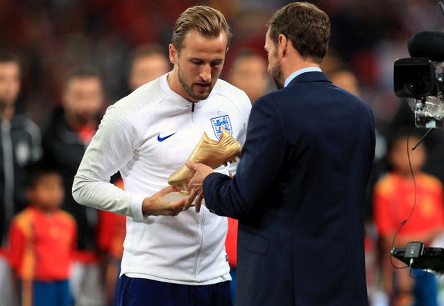 Harry Kane, left, receives the 2018 World Cup Golden Boot from his manager Gareth Southgate