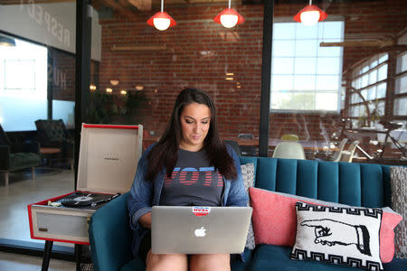 Rock the Vote Digital Director Sara Tabatabaie, 26, works on her computer in Los Angeles, California, U.S., November 4, 2016. REUTERS/Lucy Nicholson