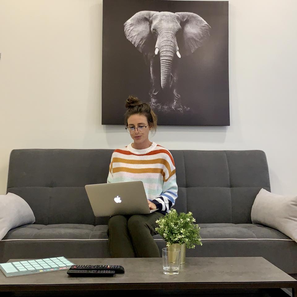 working from home in my KIRUNDO striped sweater (Katie Jackson / TODAY)