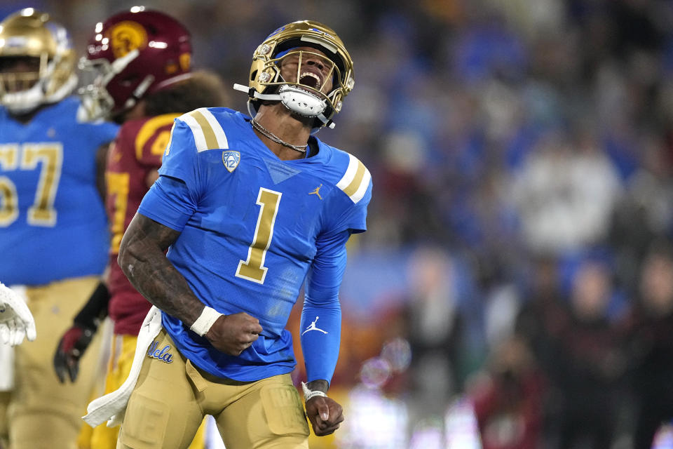 UCLA quarterback Dorian Thompson-Robinson celebrates after running the ball for a first down during the first half of an NCAA college football game against Southern California Saturday, Nov. 19, 2022, in Pasadena, Calif. (AP Photo/Mark J. Terrill)