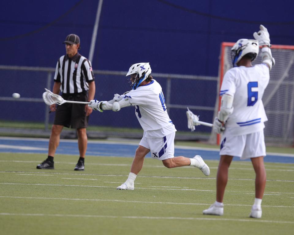 Saint Xavier's Luke Vrsansky fires this shot in for a goal against Springboro in the Division I regional championship game at Saint Xavier May 27, 2022.