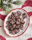 <p>The classic combo of chocolate and peppermint pair perfectly in this holiday fudge. This hard-to-resist treat is even more tempting when given a jolt of cooling peppermint extract and topped with the classic red and white striped candies. </p><p><strong><a href="https://www.countryliving.com/food-drinks/a41767504/chocolate-peppermint-fudge-recipe/" rel="nofollow noopener" target="_blank" data-ylk="slk:Get the recipe for Chocolate-Peppermint Fudge;elm:context_link;itc:0;sec:content-canvas" class="link ">Get the recipe for Chocolate-Peppermint Fudge</a>.</strong></p>