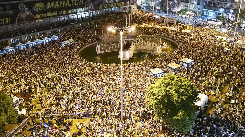 Thousands of Ukrainian football fans, pictured here cheering at the Fan Zone in downtown Kyiv, Ukraine.