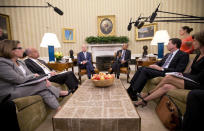 <p>President Barack Obama, center, speaks to members of the media in the Oval Office of the White House in Washington, Monday, June 13, 2016, after getting briefed on the investigation in to the shooting at a nightclub in Orlando. (AP Photo/Pablo Martinez Monsivais) </p>