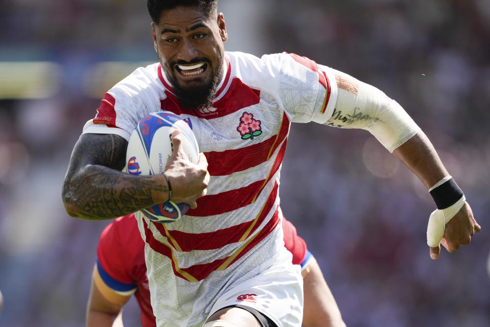 Japan's Amato Fakatava runs to score his team's first try during the Rugby World Cup Pool D match between Japan and Chile at Stadium de Toulouse, Toulouse, France, Sunday, Sept. 10, 2023. (AP Photo/Lewis Joly)