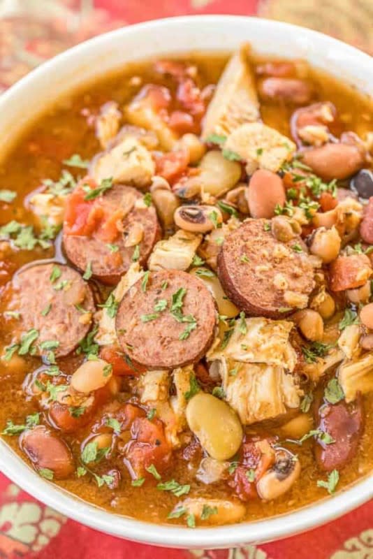 <p>Plain Chicken</p><p><strong>The whole family - even the skeptics - will pounce on this hearty, flavor-packed soup. </strong></p><p><strong>Get the recipe: <a href="https://www.plainchicken.com/slow-cooker-16-bean-country-soup/" rel="nofollow noopener" target="_blank" data-ylk="slk:Slow Cooker 16 Bean Country Soup;elm:context_link;itc:0;sec:content-canvas" class="link rapid-noclick-resp">Slow Cooker 16 Bean Country Soup</a></strong></p>