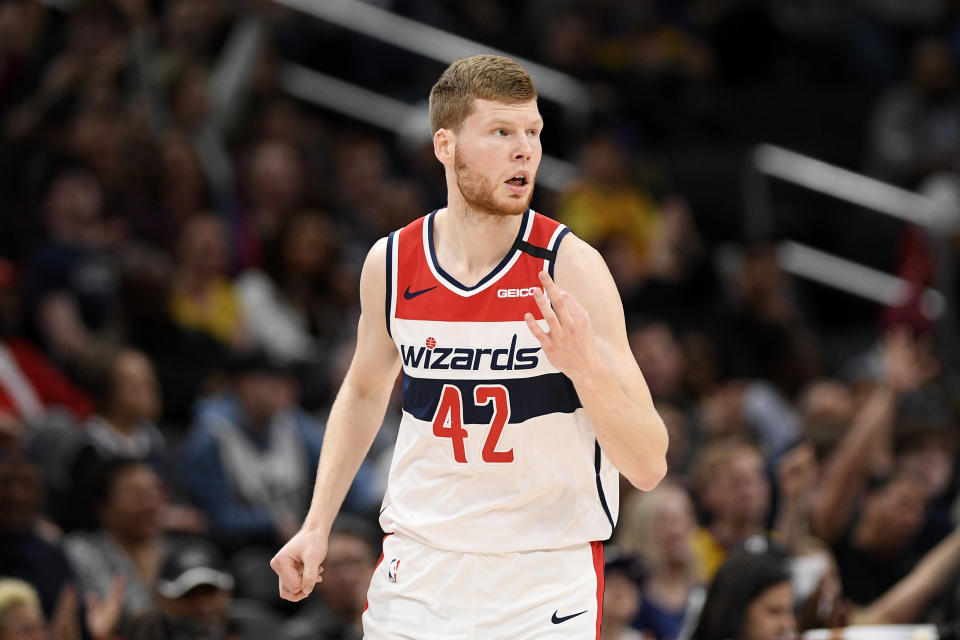 Washington Wizards forward Davis Bertans (42) reacts during the first half of an NBA basketball game against the Utah Jazz, Sunday, Jan. 12, 2020, in Washington. (AP Photo/Nick Wass)