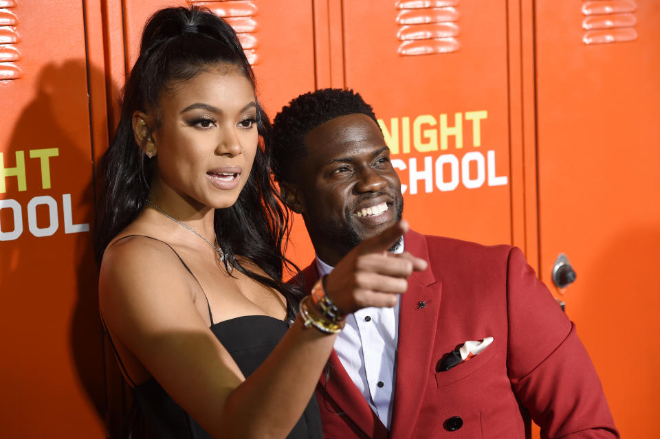 Kevin Hart, right, a cast member, producer and co-writer of "Night School," poses with his wife Eniko Parrish at the premiere of the film, Monday, Sept. 24, 2018, in Los Angeles. (Photo by Chris Pizzello/Invision/AP)